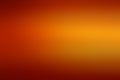 Abstract blurred orange gradient background with space for text or design