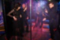 Abstract blurred people dancing in the party in the night club Royalty Free Stock Photo