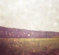 Abstract blurred photo of open field view with texture and glitter overlay Royalty Free Stock Photo