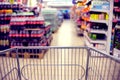 Abstract blurred photo of store with food trolley at a supermarket Royalty Free Stock Photo