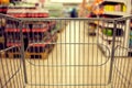 Abstract blurred photo of store with food trolley at a supermarket Royalty Free Stock Photo