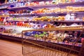 Abstract blurred photo of store with food trolley at a supermarket Royalty Free Stock Photo