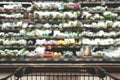 Abstract blurred photo of Supermarket aisle with empty shopping cart  in department store. Fruits and vegetables on shelves Royalty Free Stock Photo