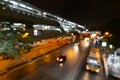 Abstract blurred traffic city of Night market on street light bokeh background. Bangkok, Thailand Cityscape at twilight time Royalty Free Stock Photo