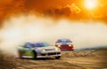 Abstract blurred two drift cars battle with smoke from burned ti Royalty Free Stock Photo