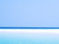 Abstract blurred on vacation summer ocean beach background. Clear blue sky, beautiful tropical sea, blue water and nice beach Royalty Free Stock Photo