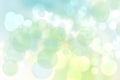Abstract blurred vivid spring summer delicate yellow blue green bokeh background texture with bright soft color circles and bokeh Royalty Free Stock Photo