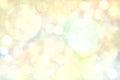 Abstract blurred vivid spring summer light delicate pastel yellow bokeh background texture with bright soft color circles. Space