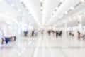 Abstract Blurred white hallway or lobby for background. It can be use for shopping mall, museum, exhibition hall event, lobby, Royalty Free Stock Photo