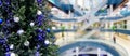Abstract Blurry or Defocus Background of Shopping Mall with Christmas Tree Royalty Free Stock Photo