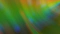 Abstract blurry green background with rainbow highlights Royalty Free Stock Photo