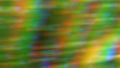 Abstract blurry green background with rainbow highlights Royalty Free Stock Photo