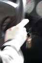 Abstract Blurry Hand on Steering Wheel