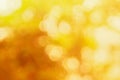 Abstract blurry orange color for background, Blur festival lights outdoor celebration and white bokeh focus texture decorative Royalty Free Stock Photo