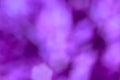Abstract blurry purple background with geometric bokeh