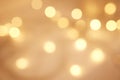 Abstract blurry twinkled lights background with bokeh defocused yellow lights. Closeup blurred glittery sparkly lights