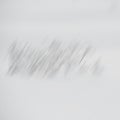 Abstract blurry white background. Diagonal gray lines on white.