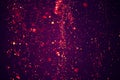 Abstract bokeh background of purple festive glitter lights dust Royalty Free Stock Photo