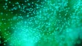 Abstract bokeh with blue and green colors and rays of light eminating from behind Royalty Free Stock Photo