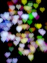 abstract bokeh blur heart shape colorful on black background decorative background love romantic Royalty Free Stock Photo