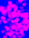 abstract bokeh blur heart shape pink bright on dark blue background decorative background love romantic Royalty Free Stock Photo