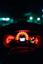 Abstract bokeh of car speed meter light dashboard with traffic