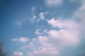 Abstract and bokeh image of sky with clouds. Retro filtered.