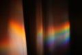 Abstract bokeh light blur with vibrant rainbow colors on dark background for creative design and artistic projects Royalty Free Stock Photo