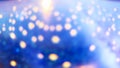 Abstract bokeh lights on blue background Royalty Free Stock Photo