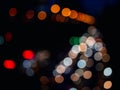 Abstract bokeh night light  background, blurred lights traces from cars on road, defocused city traffic on street at night Royalty Free Stock Photo
