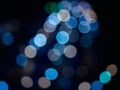 Abstract bokeh night light background, blurred lights traces from cars on road, defocused city traffic on street at night Royalty Free Stock Photo