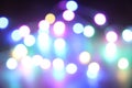 Abstract bokeh nigth background. Colorful magic lights background, decoration for the party. Neon light glowing effect Royalty Free Stock Photo