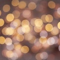 Abstract bokeh pattern featuring overlapping circular light spots in warm tones of Royalty Free Stock Photo