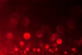 Abstract bokeh red and burgundy color circular background. Christmas light or season greeting background.Red shining lights,sparkl Royalty Free Stock Photo