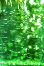 Abstract bright defocused ultra green color shiny background with water texture with bubbles with bokeh effect