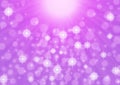 Abstract Bright Light Rays, Sparkles and Bokeh in Purple Background Royalty Free Stock Photo