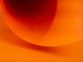 Abstract bright orange paper background for your design. Three-dimensional geometric image. Selected sharpness