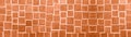 Abstract brown orange colored painted concrete cement stone square cubes texture background banner panorama Royalty Free Stock Photo