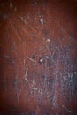 Abstract brown texture with stains, scratches and scuffs with age. Vignetting at the edges of the surface. Multicolored scuff and Royalty Free Stock Photo