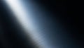 Abstract brushed metal texture with diagonal light reflection and dark background Royalty Free Stock Photo