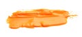Abstract brushstroke of orange paint isolated on white Royalty Free Stock Photo