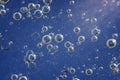 Abstract of bubbles frozen in ice lit by the sun Royalty Free Stock Photo