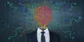 Abstract businessman with brain head on chalkboard wall backdrop with arrows and thought icons sketch. Solution, direction,