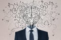 Abstract businessman with brain head on concrete wall background with arrows and thought icons sketch. Solution, direction,