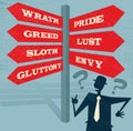 Abstract Businessman at Seven Deadly Sins Signpost. Royalty Free Stock Photo