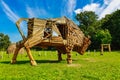 Abstract carved rustic decorative bull as a symbol of soil fertility. Wood carving is popular hobby in the culture