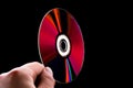 Abstract cd dvd blue-ray disk in hand Royalty Free Stock Photo