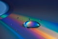Abstract CD reflection background with water droplets Royalty Free Stock Photo