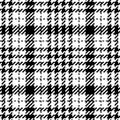 Abstract check plaid pattern tweed in black and white. Seamless classic elegant neutral tartan vector for spring summer autumn.
