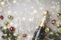 Abstract Christmas background with champagne and Christmas decorations, with golden snowflakes and copy space for text Royalty Free Stock Photo
